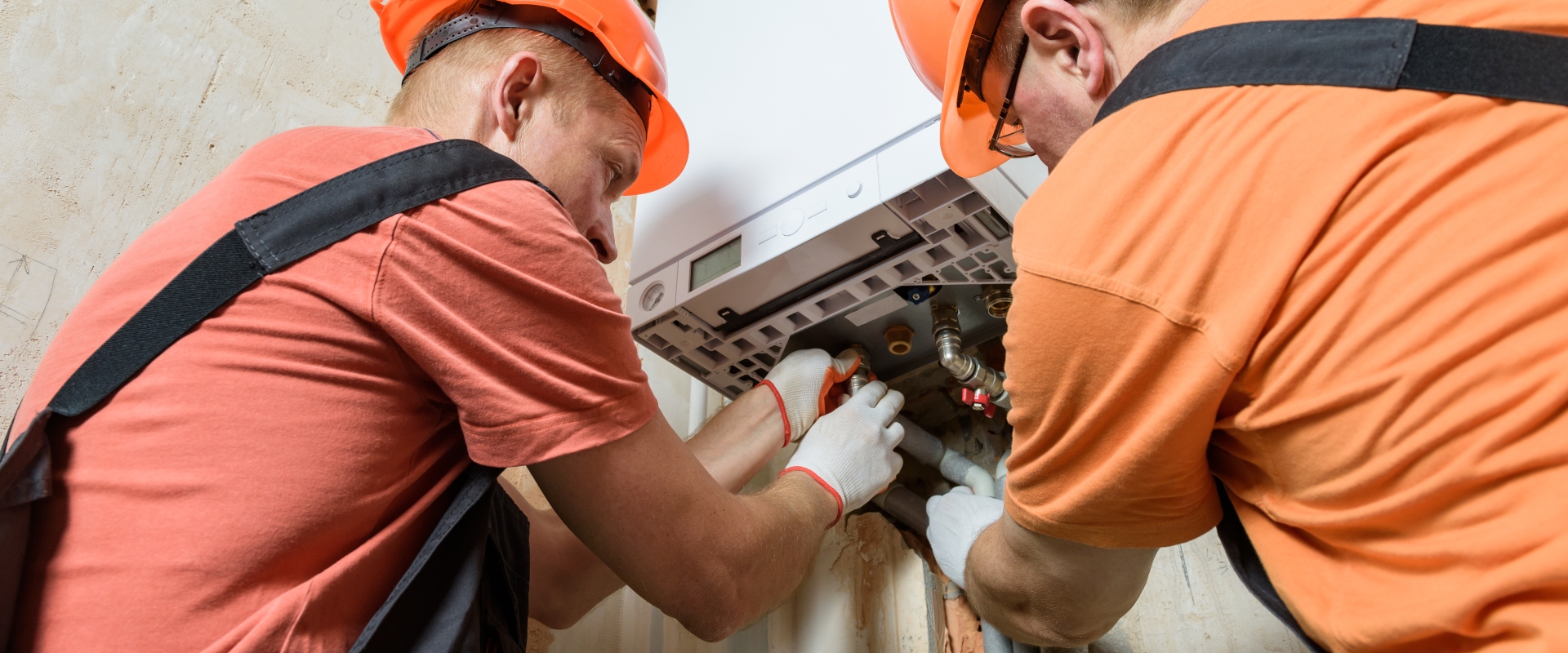 Men Doing Daily Maintenance on Boiler