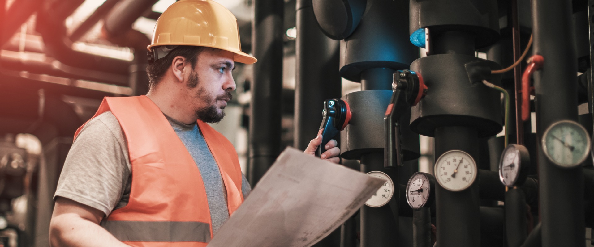 Boiler technician checking gauges