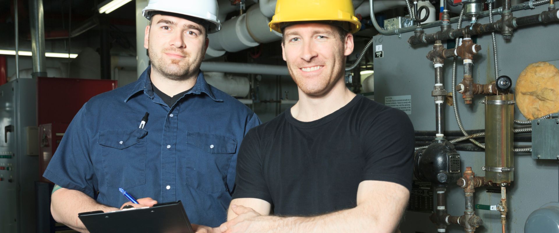 Boiler men smiling at camera